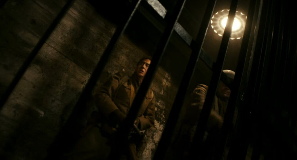 Flashback of Ben saving men from a prison during the war in France.
