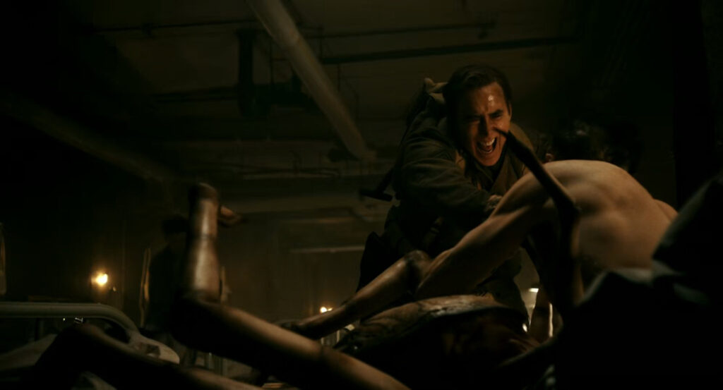 Flashback of Ben being attacked by a mutated patient during the war in France.