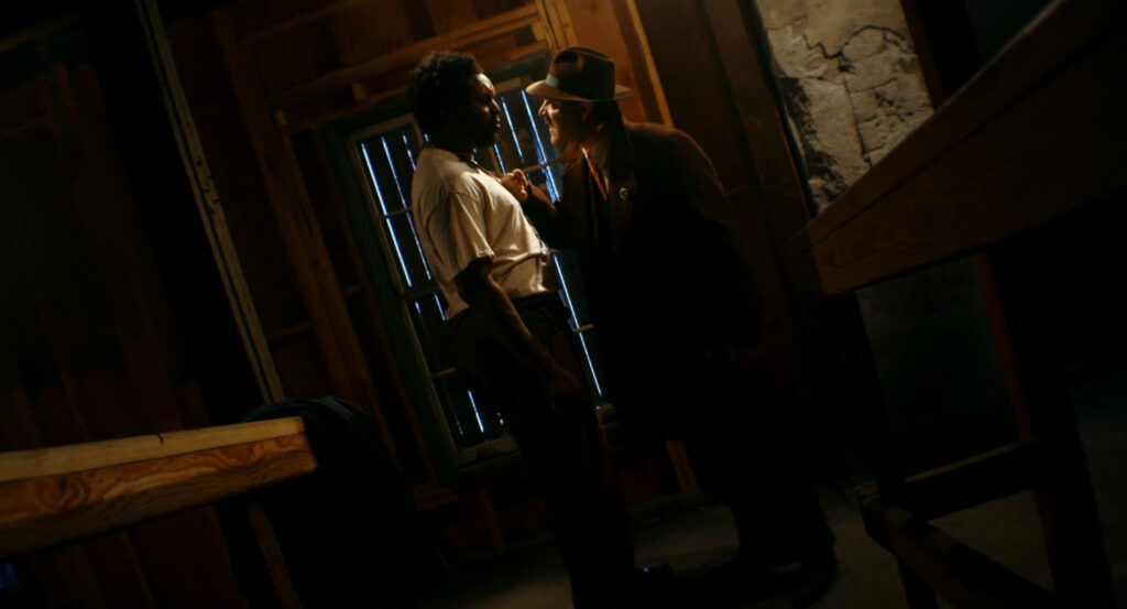 Flint and Lonnie in Lonnie's Harlem hideout.