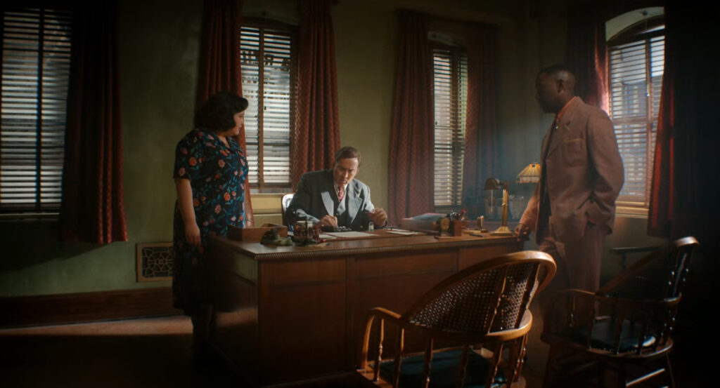 Janet, Robbie, and Ben in his office.