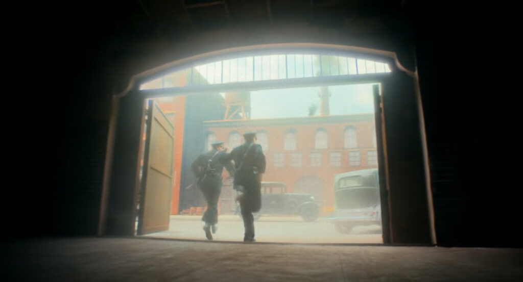 Police officers run out of a warehouse in Harlem.