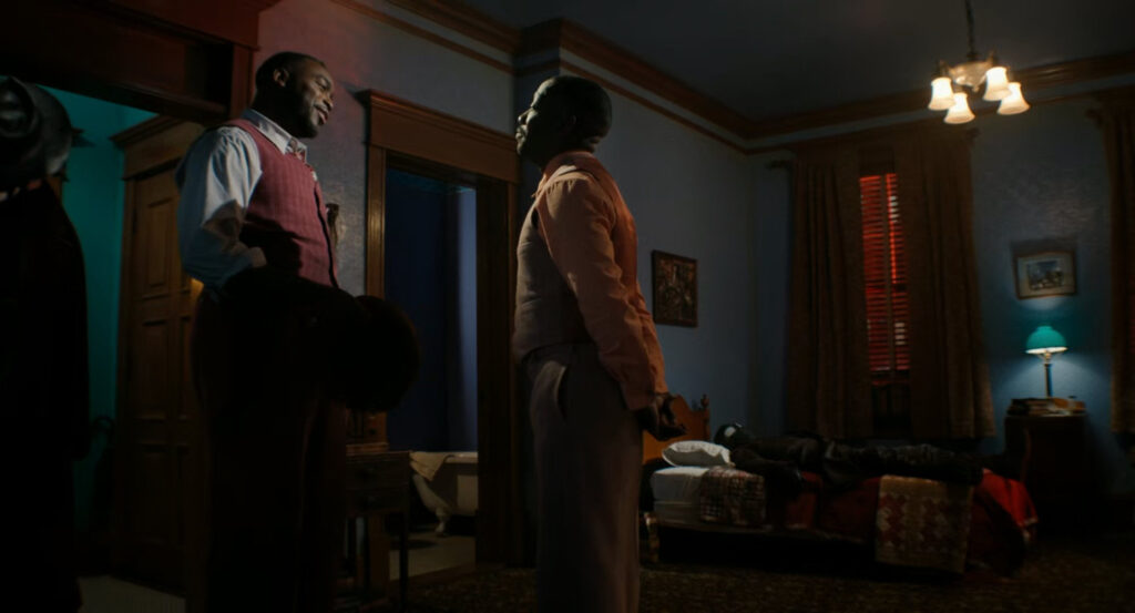 Lonnie and Robbie in Robbie's apartment.