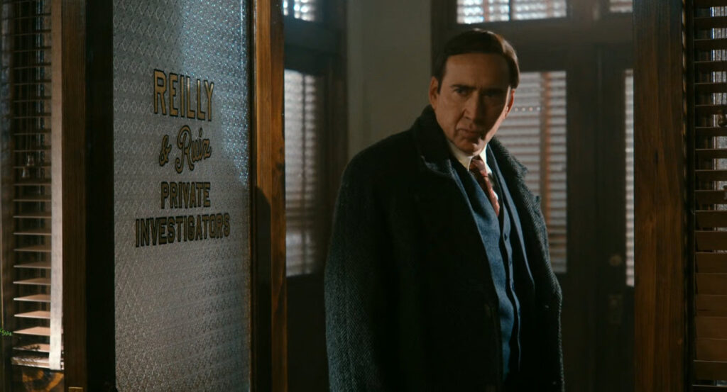 Ben in the doorway of Reilly & Ruiz Private Investigators.