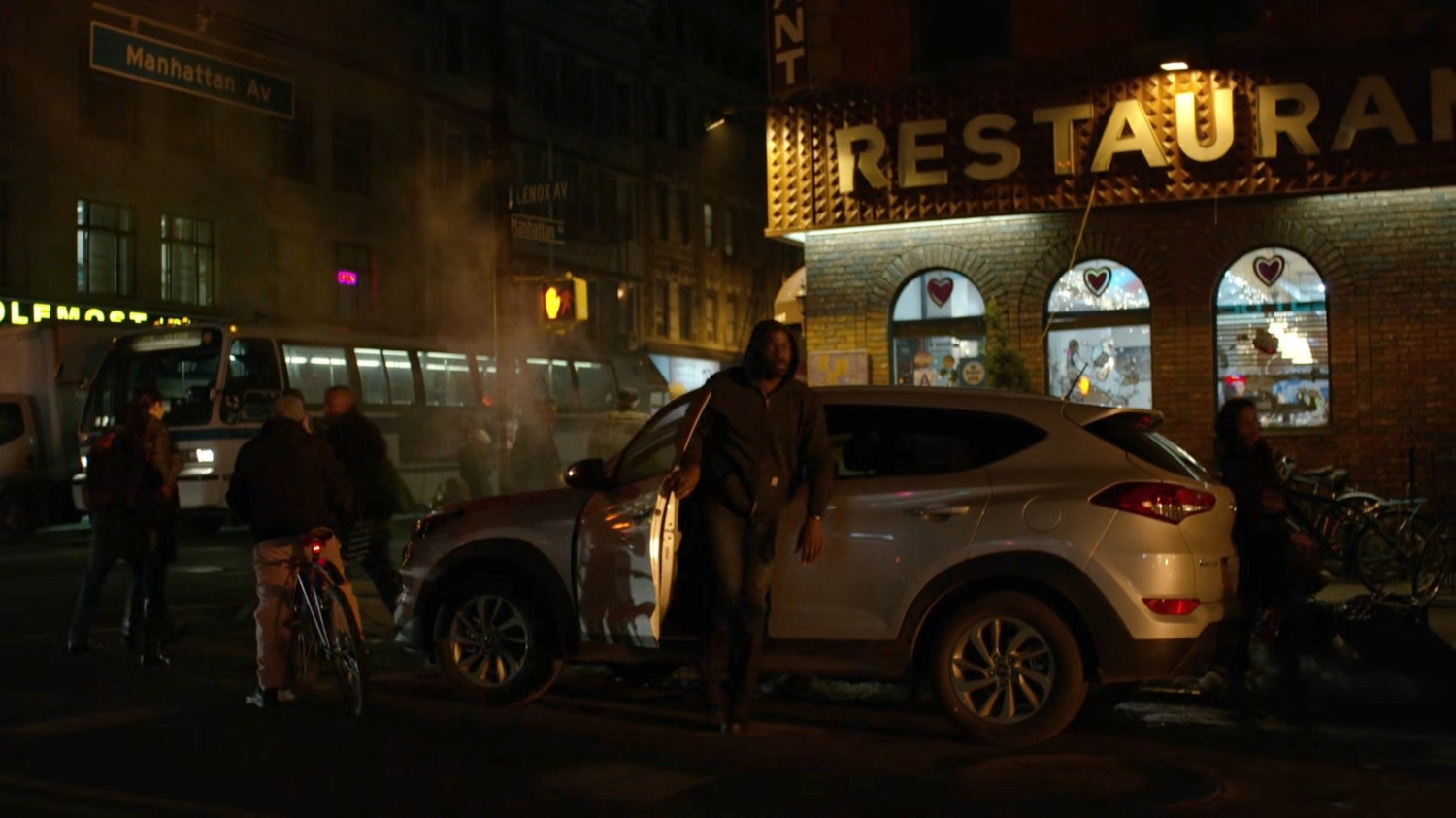 Luke returns to Harlem outside a restaurant.