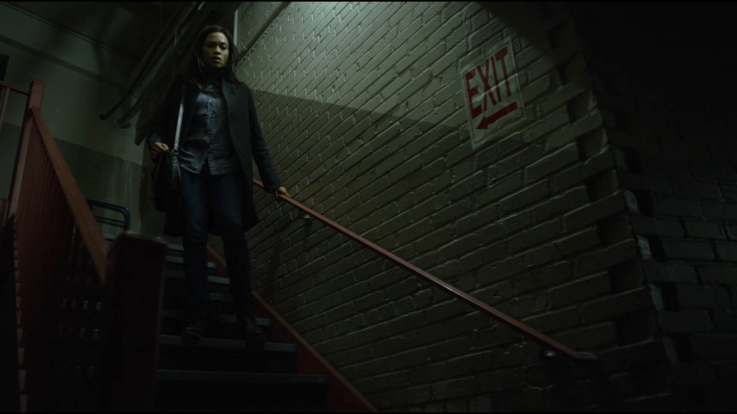 Claire in the basement stairway of Harlem's Paradise.
