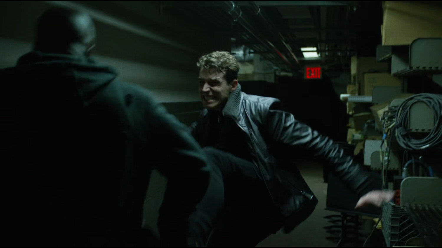 Luke fights a thug in the basement hallway of Harlem's Paradise.