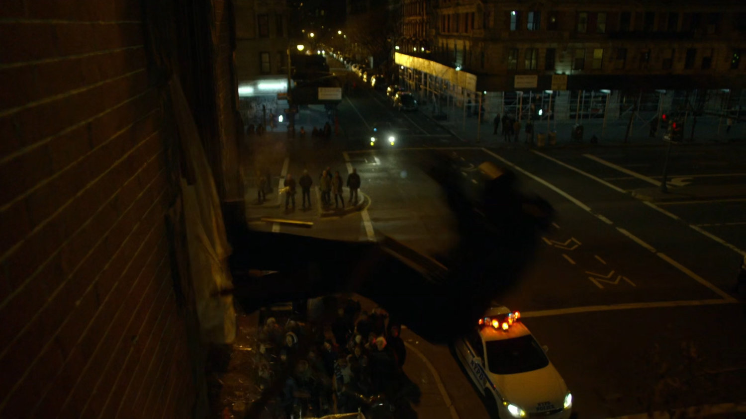 Luke thrown from the apartment above Pop's Barber Shop.