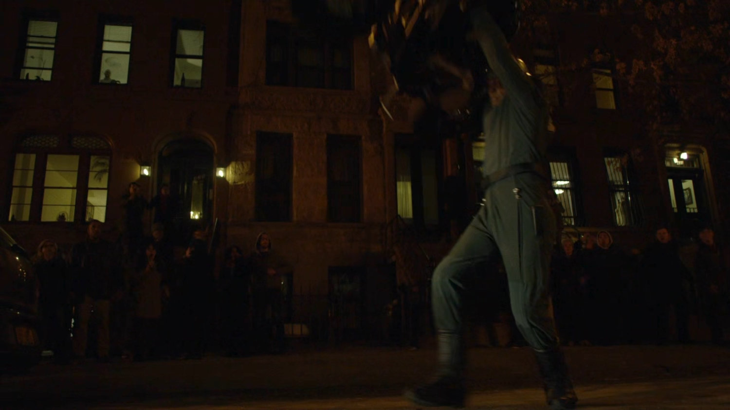 Diamond back and Luke fighting on a Harlem street.