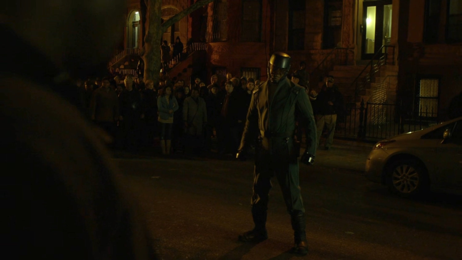 Diamond back and Luke fighting on a Harlem street.